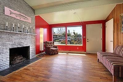 The gas logs in the floor to ceiling brick fireplace put out cozy warmth.