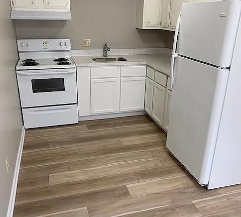Kitchen with all new appliances, and flooring