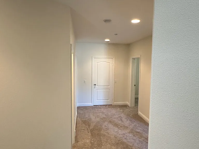 Downstairs Hallway with two extra closets - lots of storage
