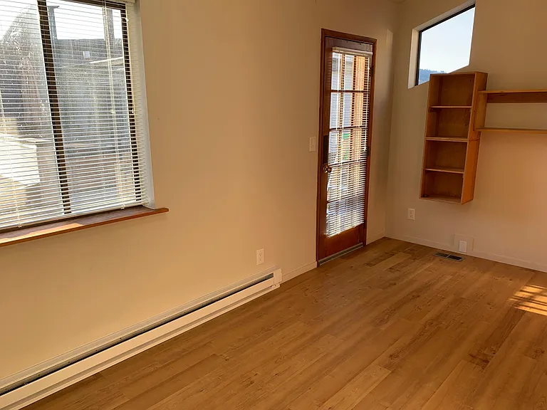 Upstairs bedroom and door to deck