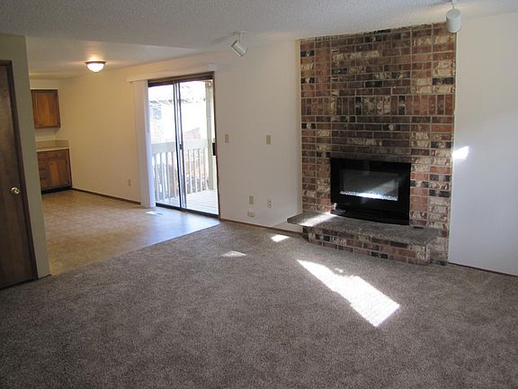 Living room with electric fireplace insert