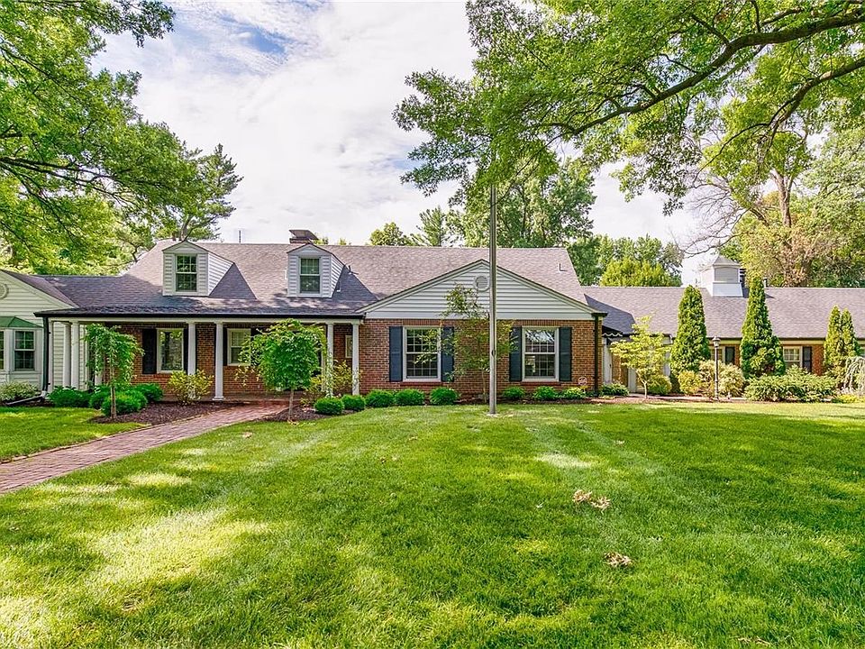 Welcome to 22 Maryhill Dr in Ladue located in a private, lovely neighborhood.