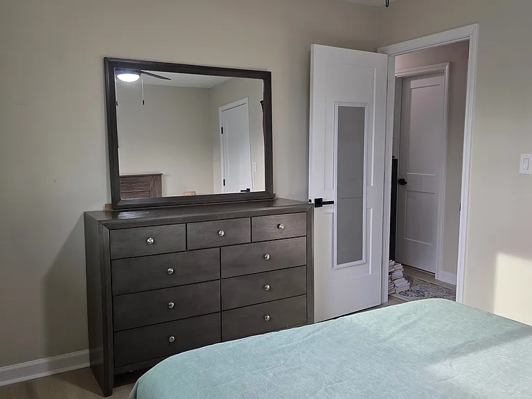 View of the 9-drawer dresser, large mirror and full-length mirror