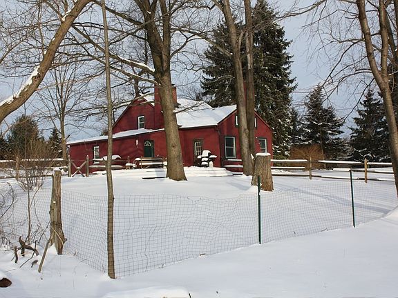 Looking at the house from the rear.