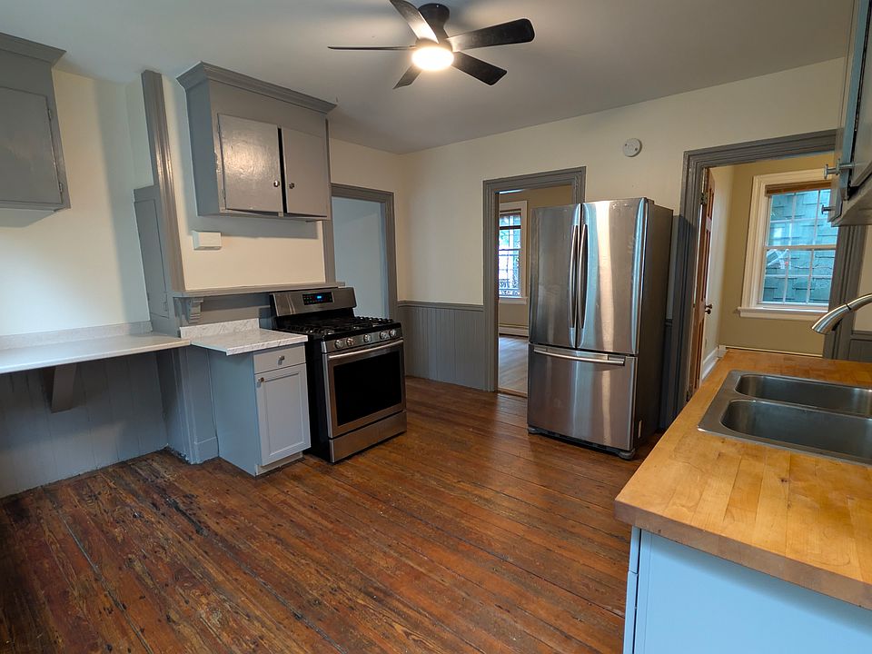 kitchen with doors to 2 bedrooms & bathroom (1st fl)