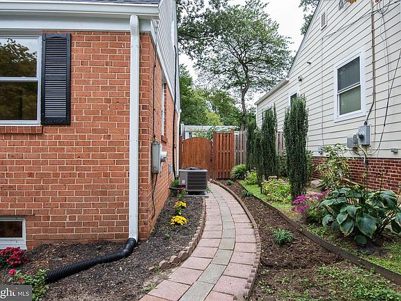 Side Walkway to Fenced Backyard and New Patio