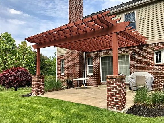 Relax and enjoy the beautiful weather from this inviting patio. The sliding doors provide easy acces