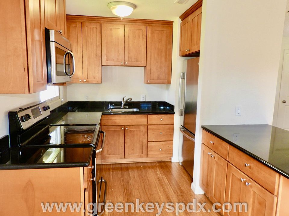 Kitchen has amazing cabinets and granite counters
