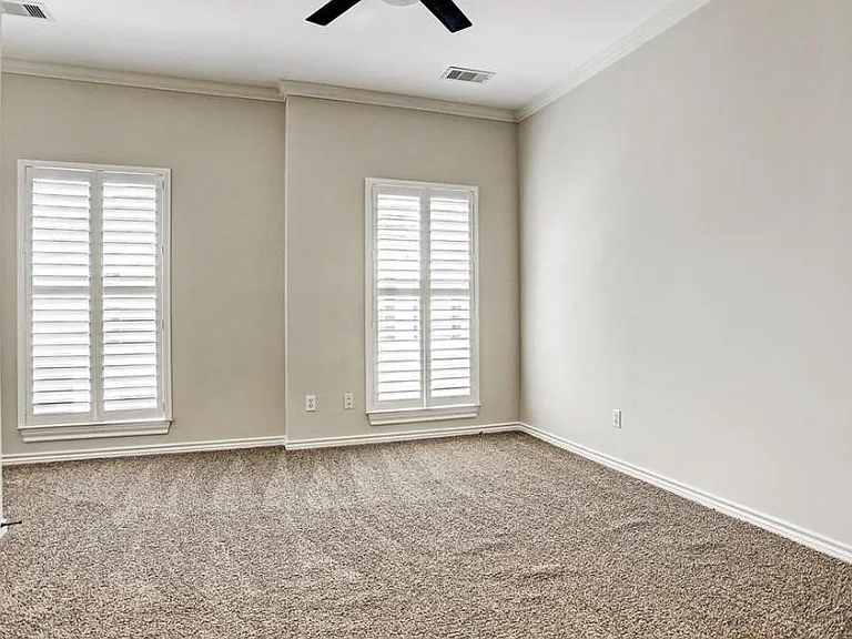 Large secondary bedroom upstairs with walk in closet and nook in this bedroom