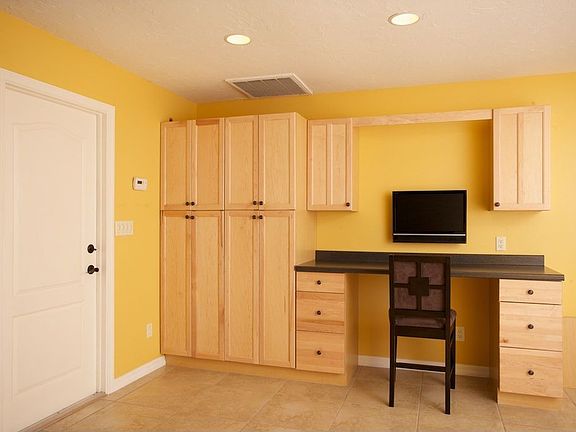 Pantry and Desk Area with Flat Screen