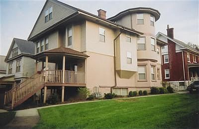Side view of entire condo complex (Unit 3 has both levels of curved portion)