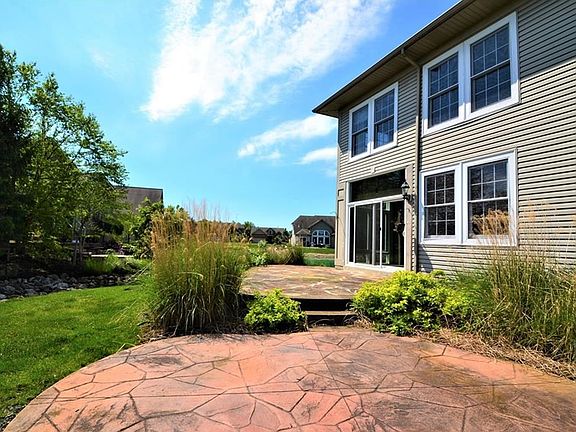 Beautiful custom, tiered stamped concrete patio.