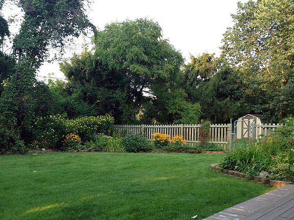 Landscaped, fenced yard