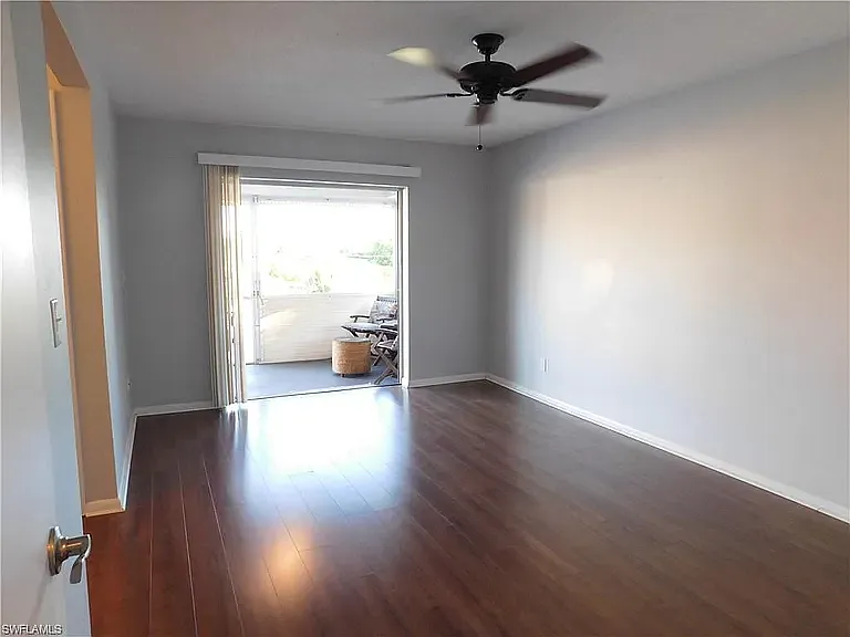 You will love this large primary bedroom with your own private bath. You will love the view from the lanai and enjoy many mornings and evenings sipping on your favorite beverage enjoying the peace and quiet.