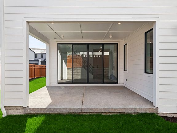 Covered Rear Patio and Fenced Rear Yard