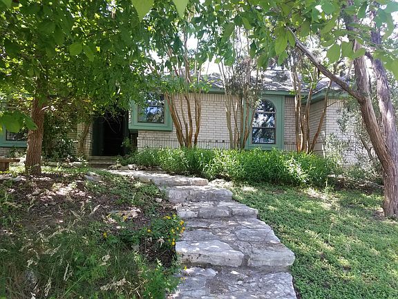 House walking up the steps