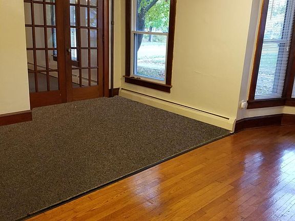 French doors lead to the bedroom