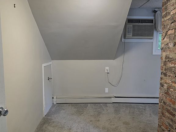 view from kitchen into DR/LR combo