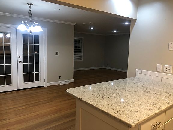 Kitchen looking into Dining and Living