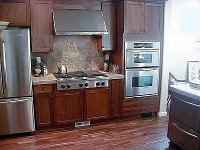 Cherry kitchen, black walnut floors .....