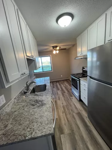Remodeled 2x1 Kitchen - Centennial & Heritage Apartments