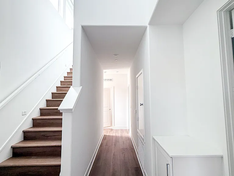 Second Floor Hallway with Open Ceiling