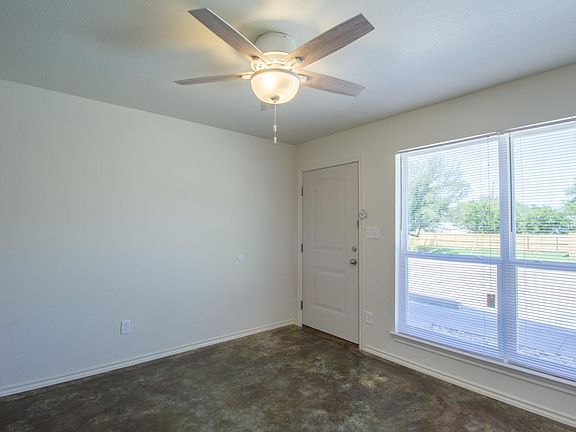Living Room with Beautiful Stained Concrete Floors