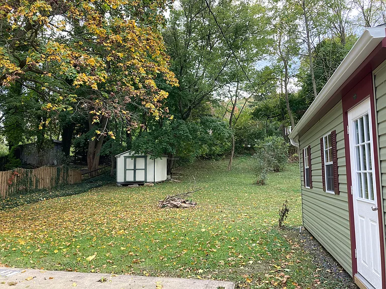 Shed and garage on property.