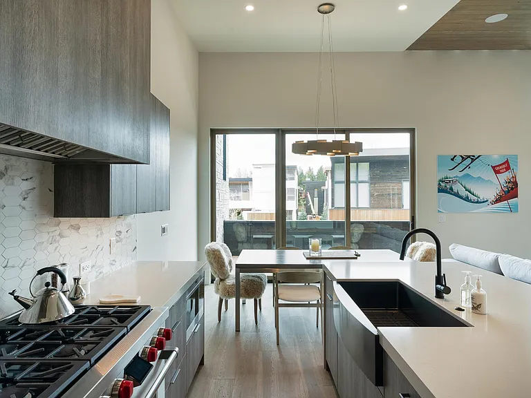 Modern, fully appointed kitchen. Complete with Wolf Range Oven and built in Subzero refrigerator.