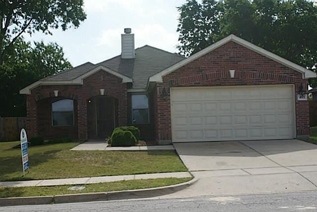 Front with 2 car garage