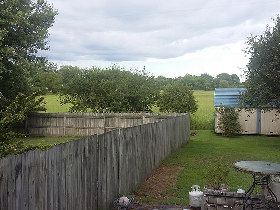 fenced in back yard with shm