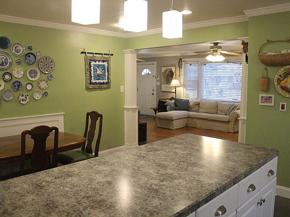 Kitchen, dining, and living.