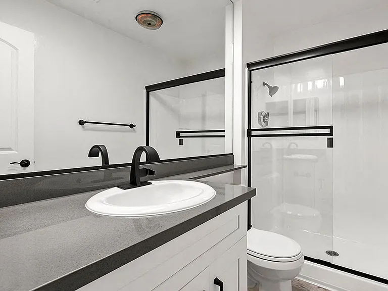 Modern styled bathroom with shower and tub.