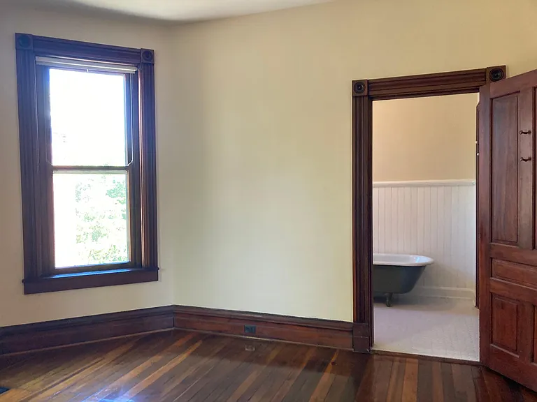 Bedroom with adjacent bath