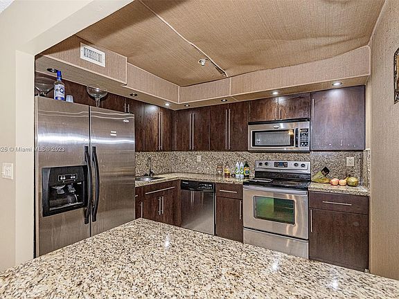 4th image of 671 NE 195th St APT 218