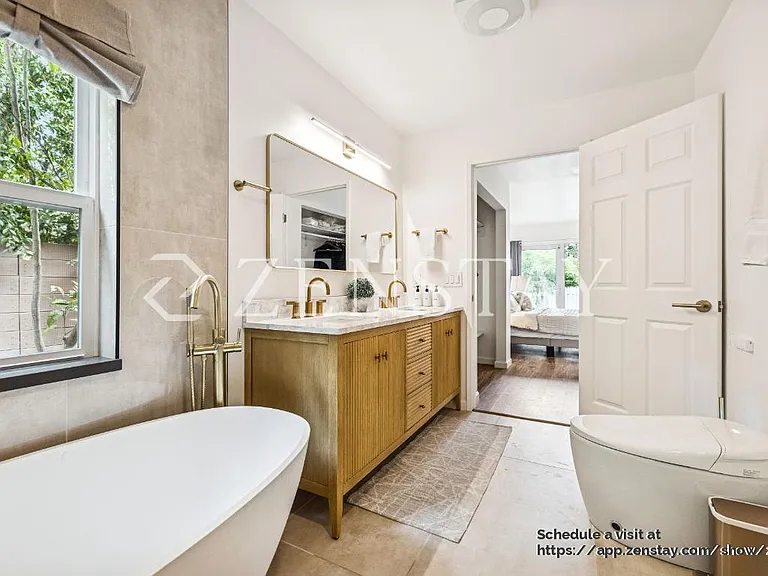 BathrooFully Renovated Master Bath with Open Shower and Soaker Tub!m 1