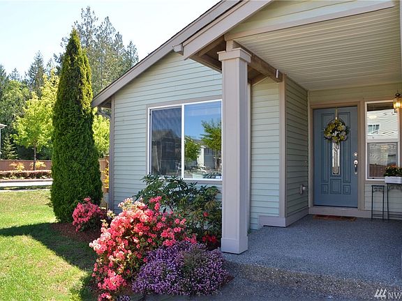Beautifully landscaped yard. Shrubs well established.