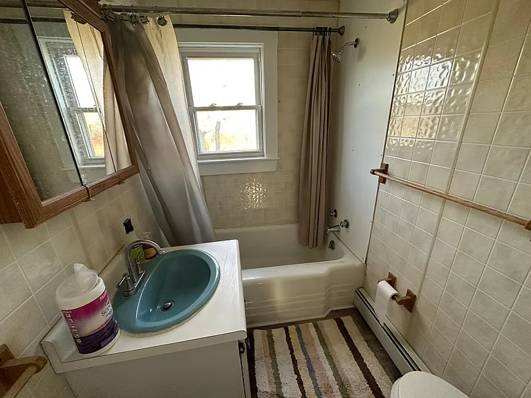 Downstairs bathroom, new toilet and faucets