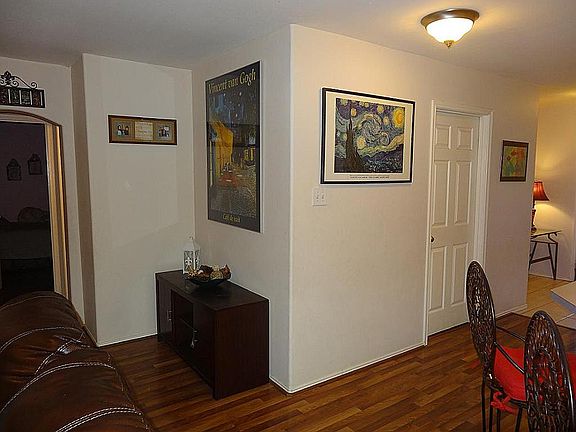 Living has wood laminate flooring