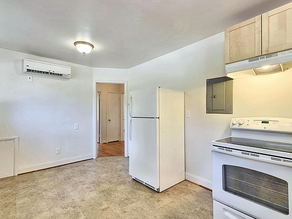 Kitchen has lots of natural light as well as a separately zoned cooling and heating system.
