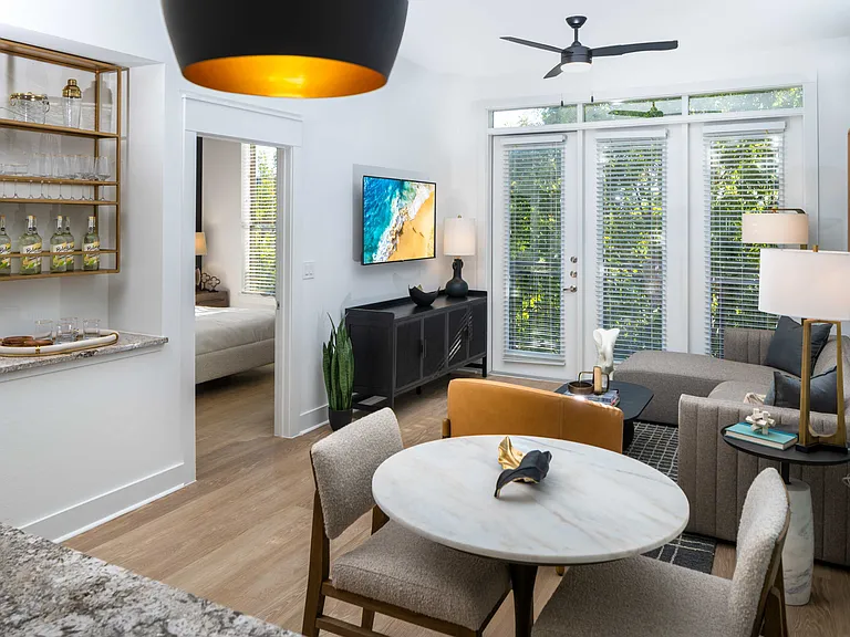 Lighted, modern ceiling fans in living and bedrooms