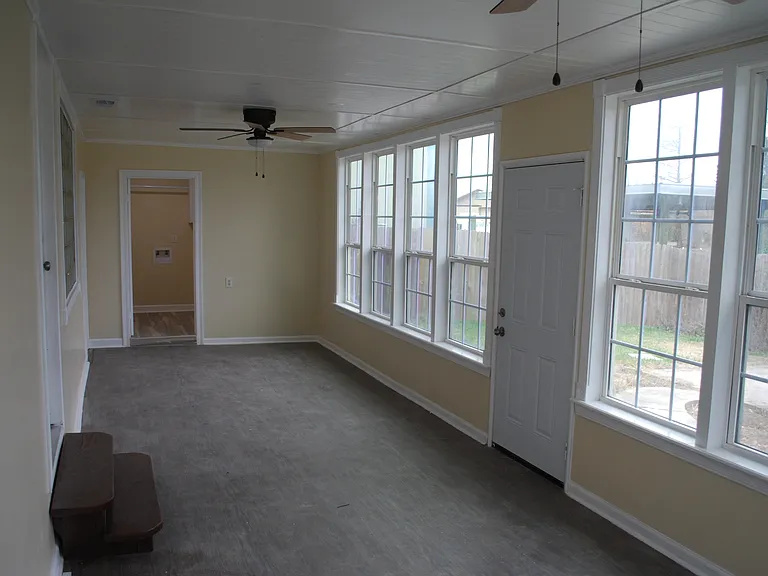 Sunroom looking to laundry/utility room
