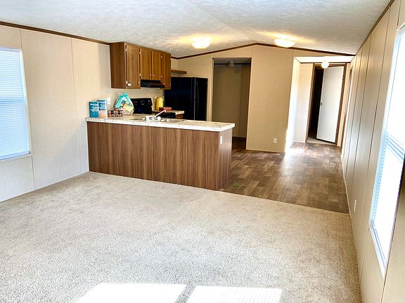 View from Living Room looking into spacious kitchen