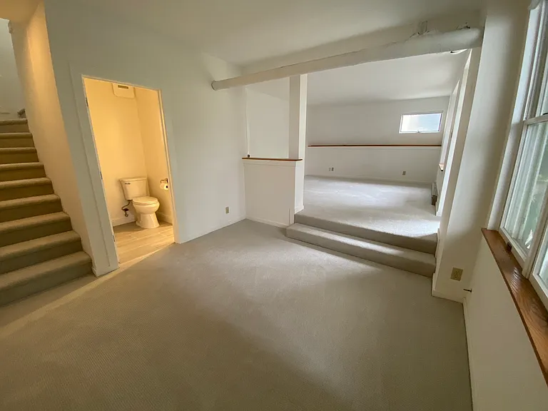 Two room bedroom/office, leading out to backyard.