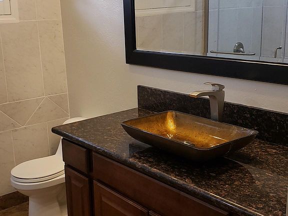 Master bathroom with oversized walk-in shower.