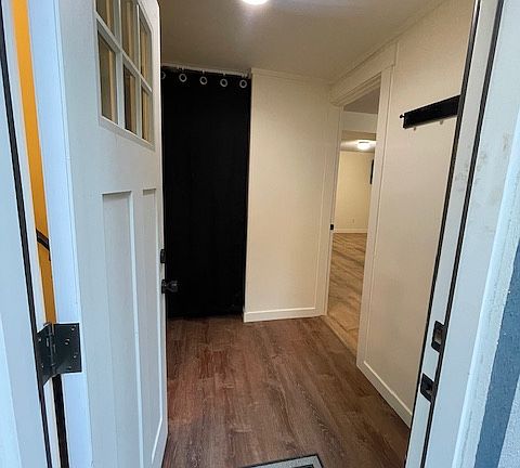 Walk into unit - kitchen and living space to the right. Bathroom to left