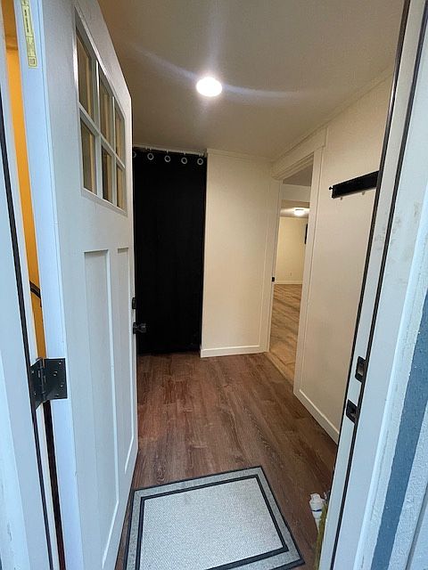 Walk into unit - kitchen and living space to the right. Bathroom to left