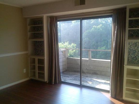 bonus room with built-in shelves