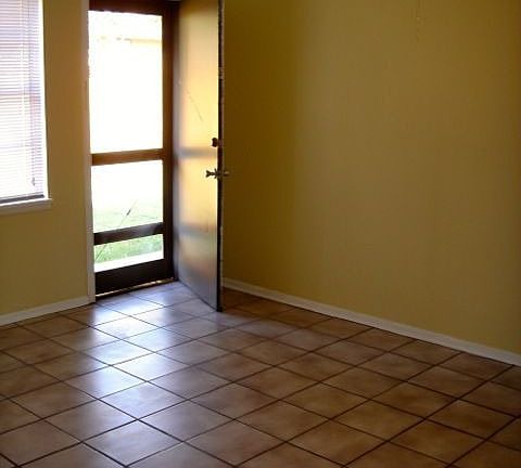 Living room and door to yard