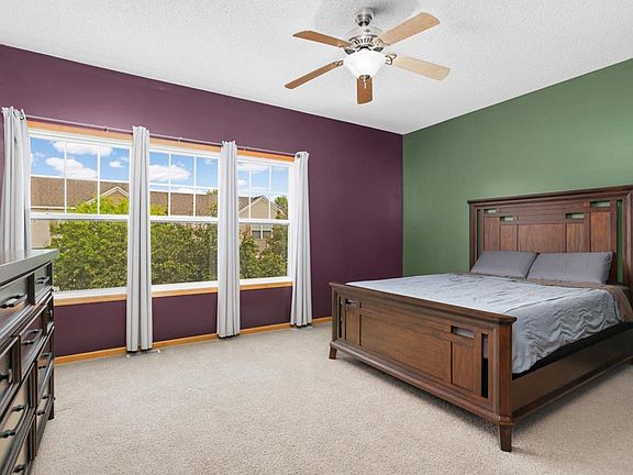 primary bedroom 1 - large primary bedroom with a walk-in closet and connected/private primary bathroom suite (near walk-in closet for convenience)